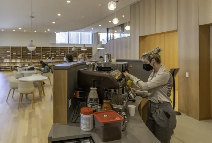 Barista making coffee in the Compass cafe.